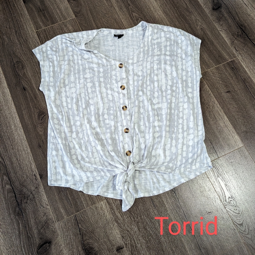 - - Torrid. Size 1. Tie waist top. Gray and white. Hi low waist. Poly…